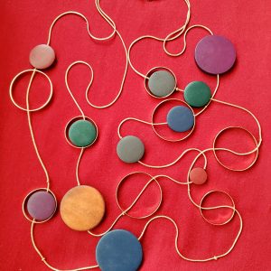 Necklace with Brown, Blue and Plum Colored Disks